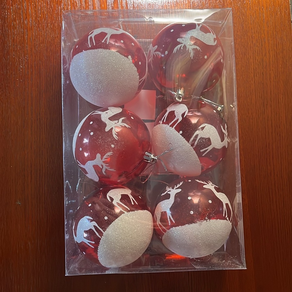 Ornaments red and white with decorative deer